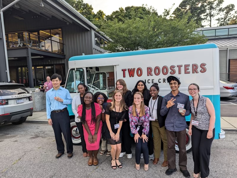 Students gathering near the Two Roosters ice cream truck